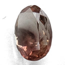 Oregon Sunstone faceted oval cut gemstone, 0.91ct, from Plush, Oregon, on a white background, view 5 of 11