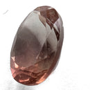 Oregon Sunstone faceted oval cut gemstone, 0.91ct, from Plush, Oregon, on a white background, view 6 of 11