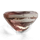 Oregon Sunstone faceted oval cut gemstone, 0.91ct, from Plush, Oregon, on a white background, view 7 of 11