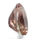 Oregon Sunstone faceted oval cut gemstone, 0.91ct, from Plush, Oregon, on a white background, view 9 of 11