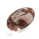 Oregon Sunstone faceted oval cut gemstone, 0.91ct, from Plush, Oregon, on a white background, view 10 of 11