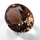 Oregon Sunstone faceted oval cut gemstone, 1.81ct, from Plush, Oregon, on a white background, view 3 of 11