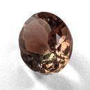 Oregon Sunstone faceted oval cut gemstone, 1.81ct, from Plush, Oregon, on a white background, view 4 of 11