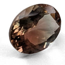 Oregon Sunstone faceted oval cut gemstone, 1.81ct, from Plush, Oregon, on a white background, view 11 of 11