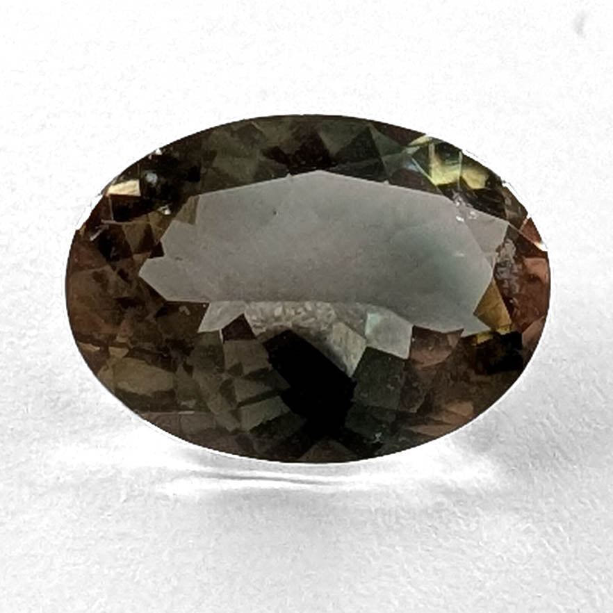 Oregon Sunstone faceted oval cut gemstone, 1.86ct, from Plush, Oregon, on a white background, view 1 of 10