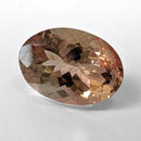 Oregon Sunstone faceted oval cut gemstone, 5.57ct, from Plush, Oregon, on a white background, view 3 of 11