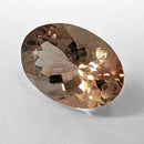 Oregon Sunstone faceted oval cut gemstone, 5.57ct, from Plush, Oregon, on a white background, view 4 of 11