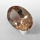 Oregon Sunstone faceted oval cut gemstone, 5.57ct, from Plush, Oregon, on a white background, view 5 of 11