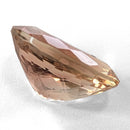 Oregon Sunstone faceted oval cut gemstone, 5.57ct, from Plush, Oregon, on a white background, view 9 of 11