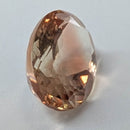 Oregon Sunstone faceted oval cut gemstone, 5.57ct, from Plush, Oregon, on a white background, view 11 of 11