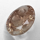 Oregon Sunstone faceted oval fantasy cut gemstone, 2.20ct, from Plush, Oregon, on a white background, view 11 of 11