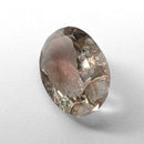 Oregon Sunstone faceted oval fantasy cut gemstone, 3.11ct, from Plush, Oregon, on a white background, view 6 of 15