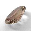 Oregon Sunstone faceted oval fantasy cut gemstone, 3.11ct, from Plush, Oregon, on a white background, view 8 of 15