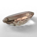 Oregon Sunstone faceted oval fantasy cut gemstone, 3.11ct, from Plush, Oregon, on a white background, view 9 of 15