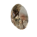 Oregon Sunstone faceted oval fantasy cut gemstone, 4.31ct, from Plush, Oregon, on a white background, view 7 of 10