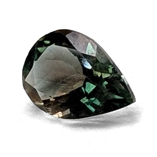 Oregon Sunstone faceted pear cut gemstone, 0.59ct, from Plush, Oregon, on a white background, view 1 of 8