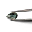 Oregon Sunstone faceted pear cut gemstone, 0.59ct, from Plush, Oregon, held in tweezers, view 2 of 8