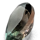 Oregon Sunstone faceted pear cut gemstone, 0.59ct, from Plush, Oregon, on a white background, view 3 of 8