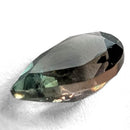 Oregon Sunstone faceted pear cut gemstone, 0.59ct, from Plush, Oregon, on a white background, view 6 of 8