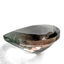 Oregon Sunstone faceted pear cut gemstone, 0.59ct, from Plush, Oregon, on a white background, view 7 of 8