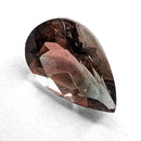 Oregon Sunstone faceted pear cut gemstone, 0.84ct, from Plush, Oregon, on a white background, view 3 of 9