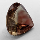 Oregon Sunstone faceted pear cut gemstone, 5.21ct, from Plush, Oregon, on a white background, view 5 of 12