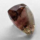 Oregon Sunstone faceted pear cut gemstone, 5.21ct, from Plush, Oregon, on a white background, view 6 of 12