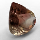 Oregon Sunstone faceted pear cut gemstone, 5.21ct, from Plush, Oregon, on a white background, view 10 of 12