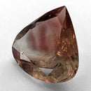 Oregon Sunstone faceted pear cut gemstone, 5.21ct, from Plush, Oregon, on a white background, view 11 of 12