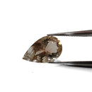 Oregon Sunstone faceted pear fantasy cut gemstone, 3.76ct, from Plush, Oregon, held in tweezers, view 2 of 11