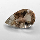 Oregon Sunstone faceted pear fantasy cut gemstone, 3.76ct, from Plush, Oregon, on a white background, view 4 of 11