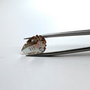 Oregon sunstone faceted pear fantasy cut gemstone, 4.88ct, held in tweezers, view 9 of 10
