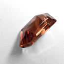 Oregon Sunstone faceted freeform step cut gemstone, 6.70ct, from Plush, Oregon, on a white background, view 5 of 10