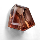 Oregon Sunstone faceted freeform step cut gemstone, 6.70ct, from Plush, Oregon, on a white background, view 8 of 10