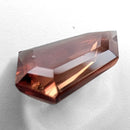 Oregon Sunstone faceted freeform step cut gemstone, 6.70ct, from Plush, Oregon, on a white background, view 9 of 10