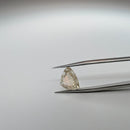 Oregon Sunstone faceted trillion fantasy cut gemstone, 2.50ct, from Plush, Oregon, held in tweezers, view 4 of 10