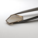 Smoky Quartz faceted freeform flatback step cut gemstone, 5.35ct, held in tweezers, view 2 of 8