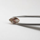 Sunstone faceted marquise fantasy cut gemstone, 2.43ct, held in tweezers, view 10 of 12