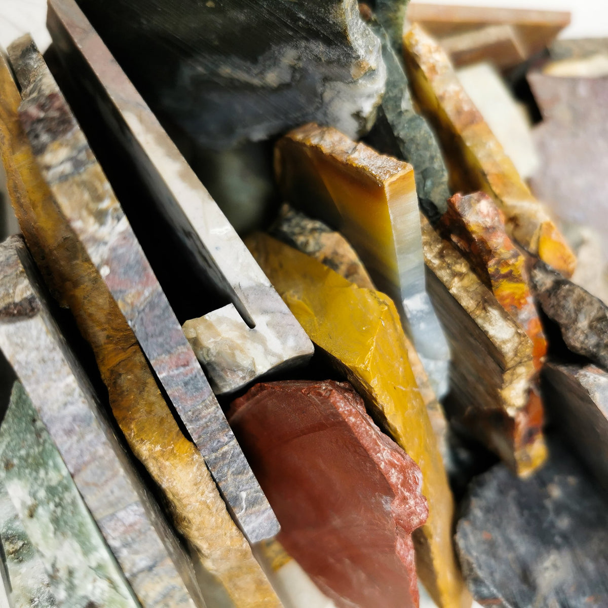 Assorted lapidary slab – close-up of stacked slabs