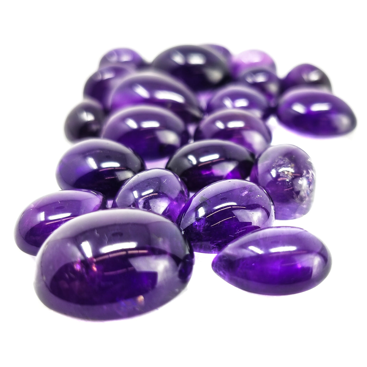 Amethyst cabochon, a variety of quartz, from Brazil.