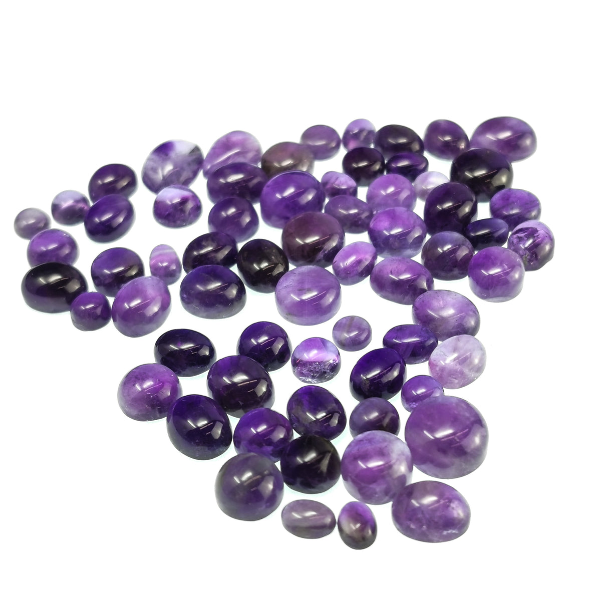 Amethyst cabochon, a variety of quartz, from Brazil.