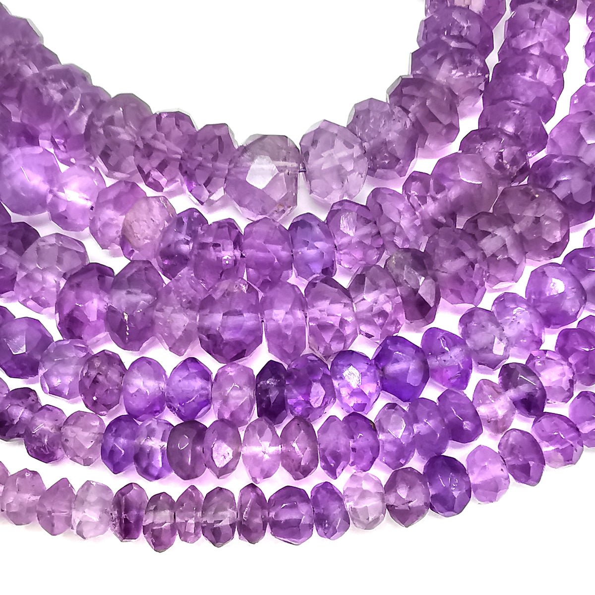 Amethyst facet bead necklace in sterling silver and steel wire.