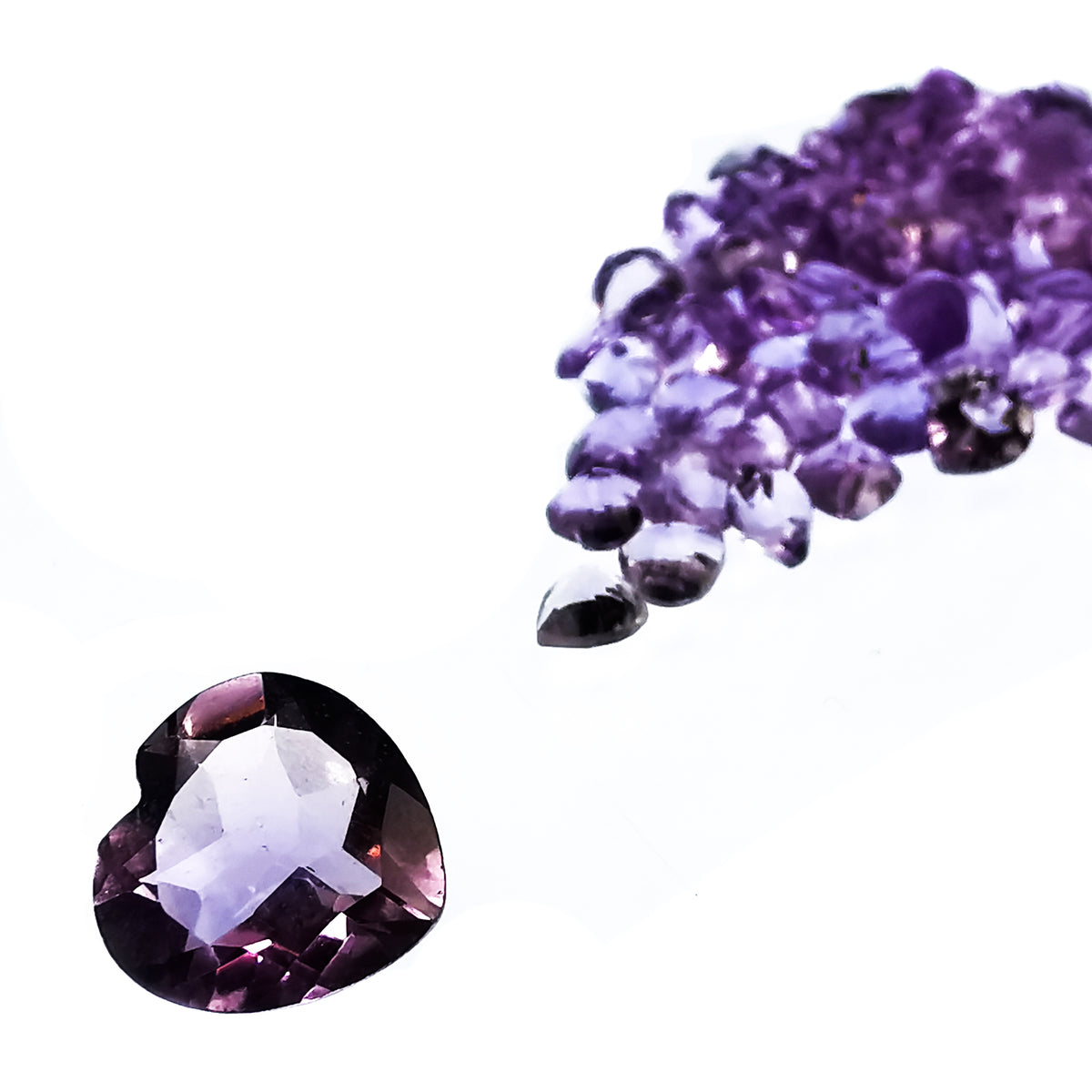 Amethyst heart facet, a variety of quartz, from Brazil.