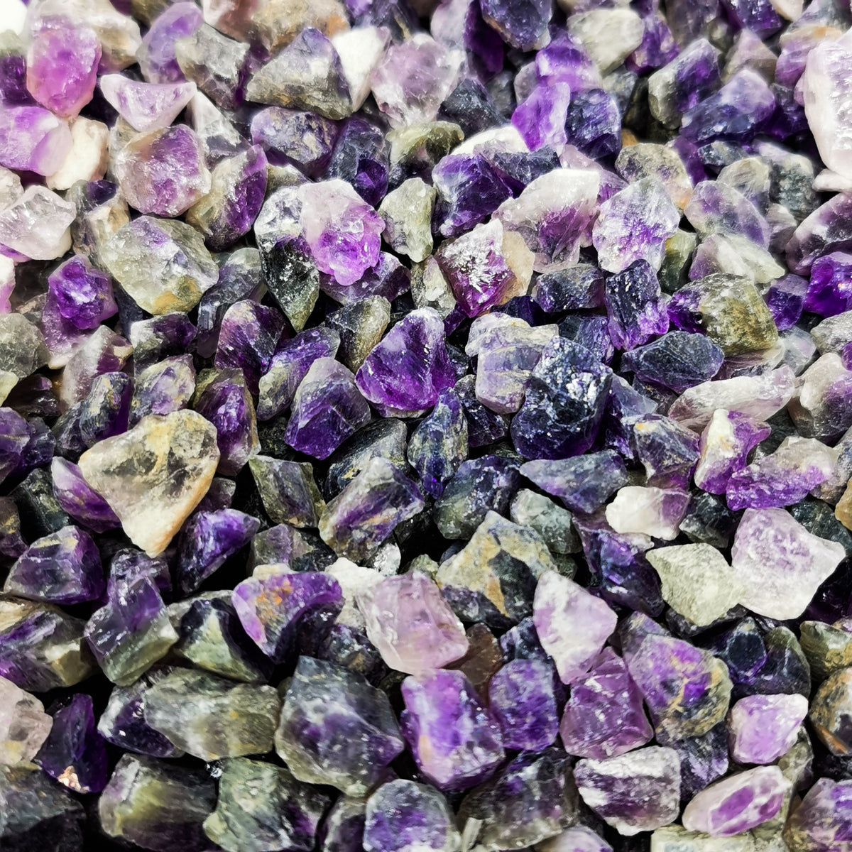 Amethyst Chips rough, a variety of quartz, from Brazil.