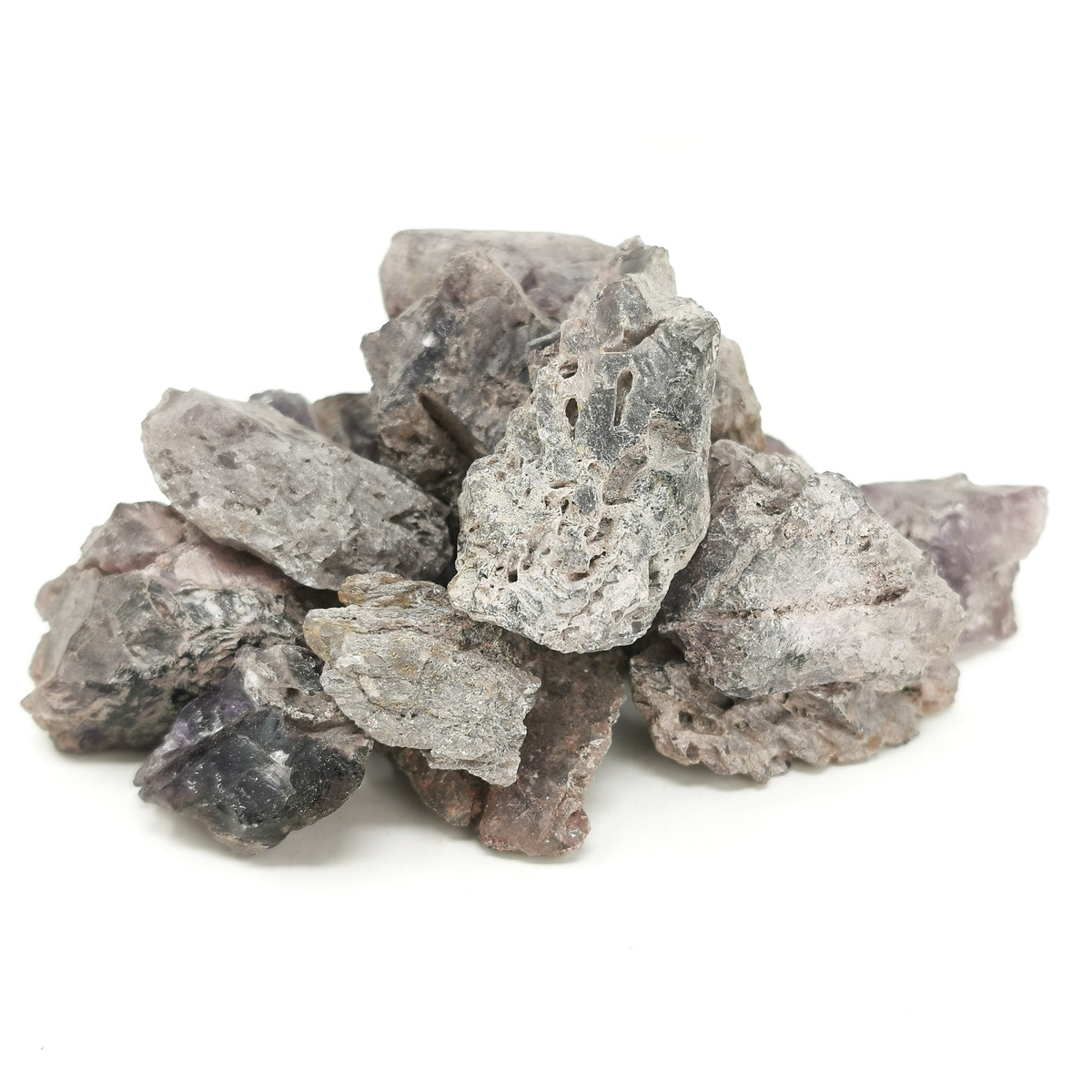 Four Peaks amethyst rough from the Four Peaks Wilderness, Tonto National Forest, Arizona, USA, hazy outer skin over translucent to transparent purple quartz