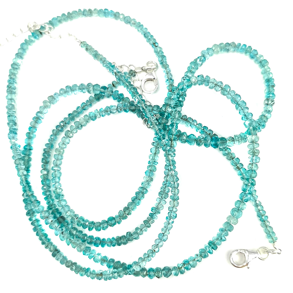 Blue Apatite facet bead necklace in sterling silver and steel wire.