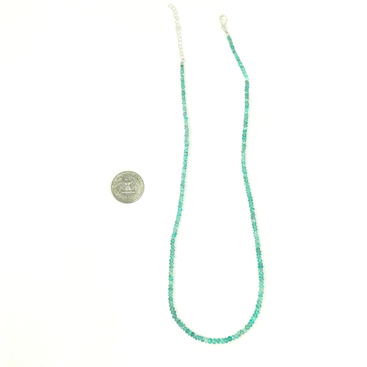 Blue Apatite facet bead necklace in sterling silver and steel wire.