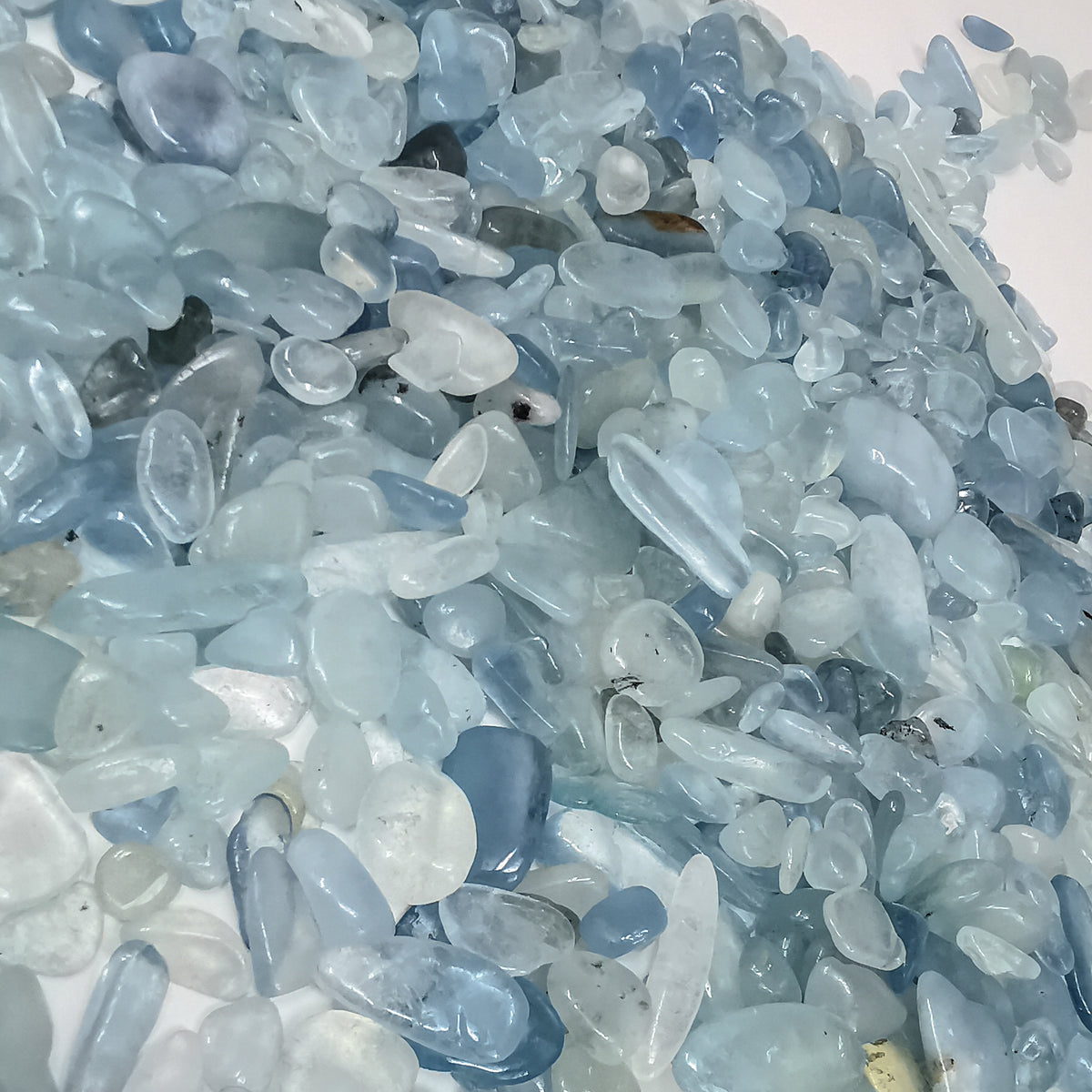 Aquamarine tumble (mini), a variety of beryl.