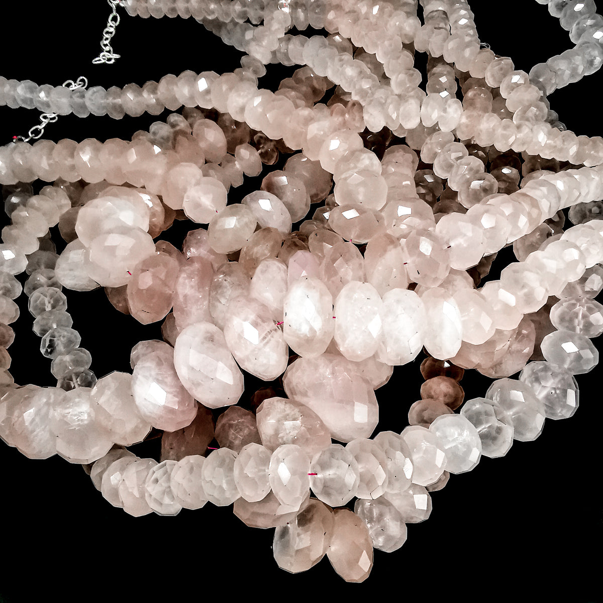 Rose Quartz large facet gradient bead necklace in sterling silver and steel wire.