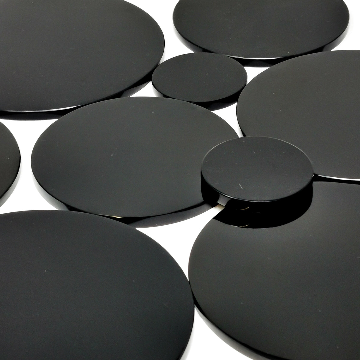 Black Obsidian mirror, a volcanic glass, from Mexico.